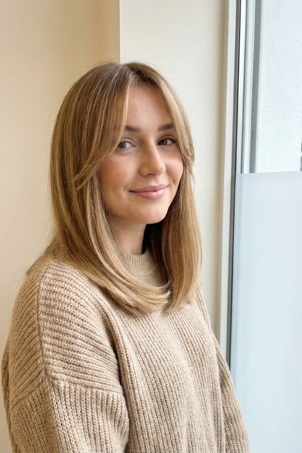 25 Trendy Shoulder Length Hairstyles to Try 3 Curtain Bangs Lob