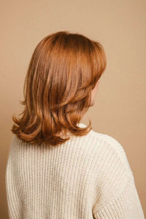 25 Trendy Shoulder Length Hairstyles to Try 11 Feathered Lob Layers