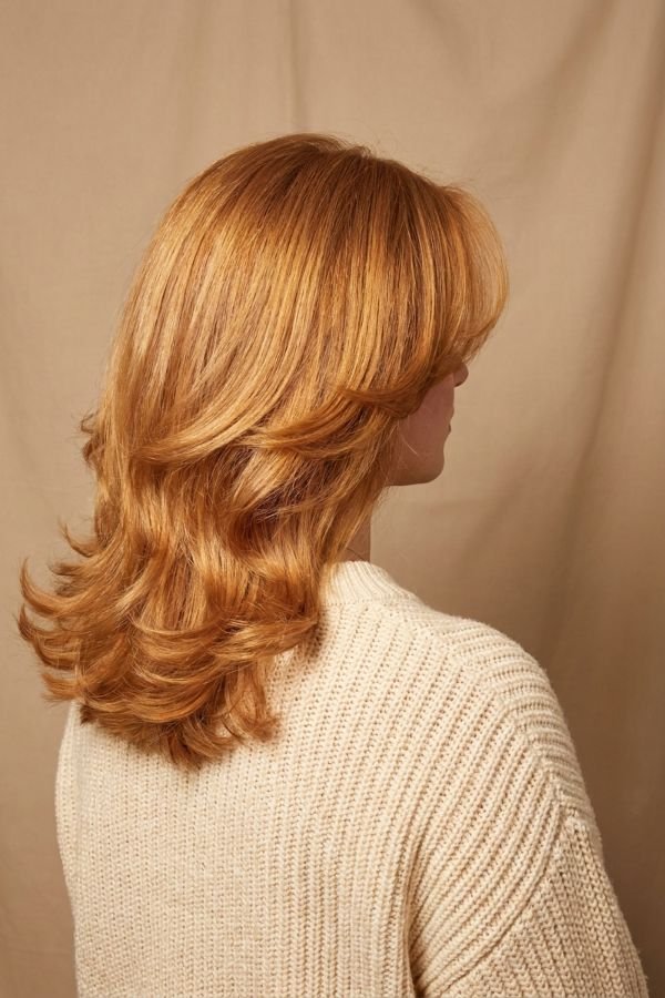 30 Trendy Medium Length Hairstyles You'll Love 12 Feathered Medium Cut