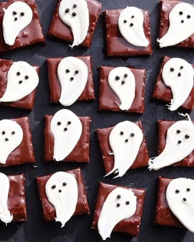 17 Halloween Finger Food Ideas for a Spooky Party Everyone Will Love 5 Ghost Brownie Bites – Halloween Treat