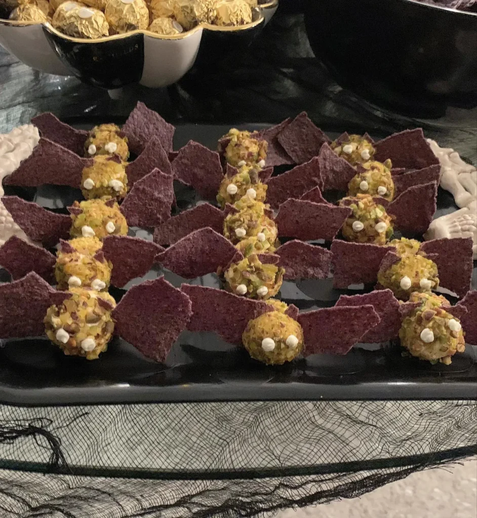 20 Halloween Party Food Ideas for a Spooky and Delicious Celebration 17 Halloween Bat Cheese Ball Bites
