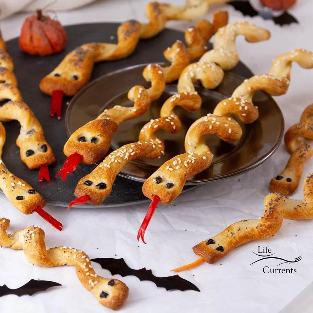45 Halloween Potluck Recipes Everyone Will Want to Try 45 Halloween Breadstick Snakes