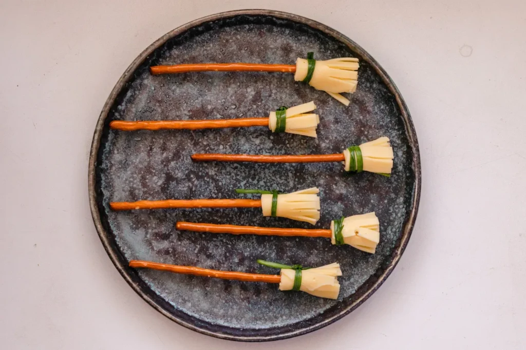 45 Halloween Potluck Recipes Everyone Will Want to Try 16 Halloween Cheese Broomsticks