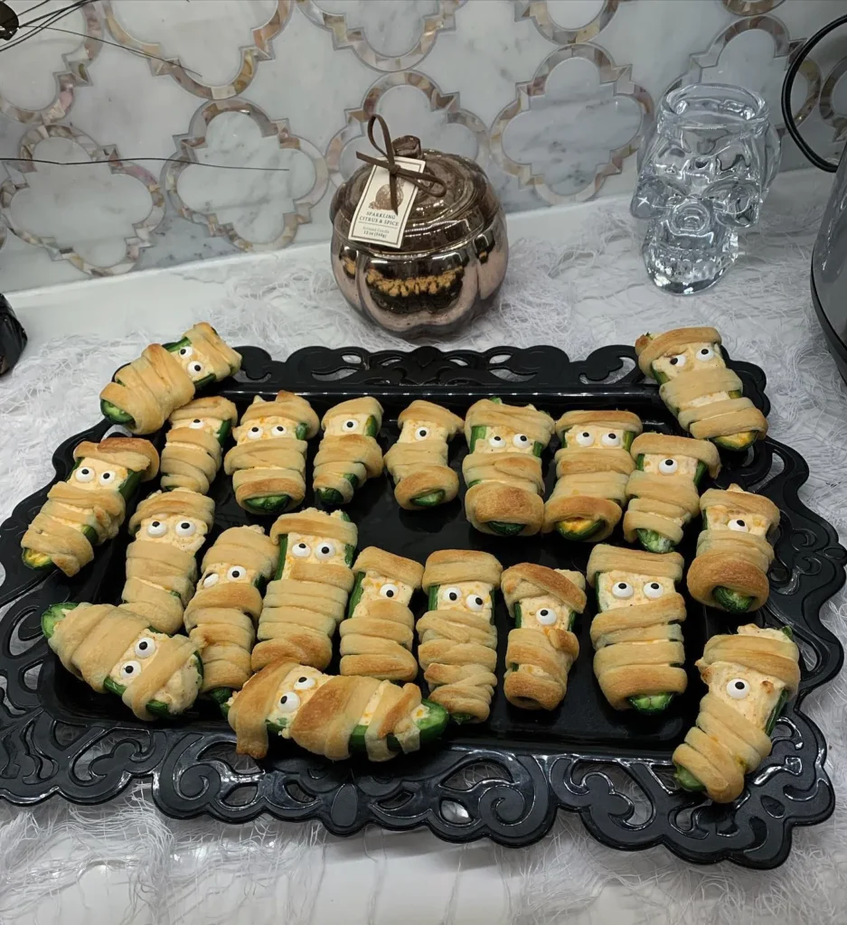 20 Halloween Party Food Ideas for a Spooky and Delicious Celebration 16 Halloween Mummy Jalapeño Poppers