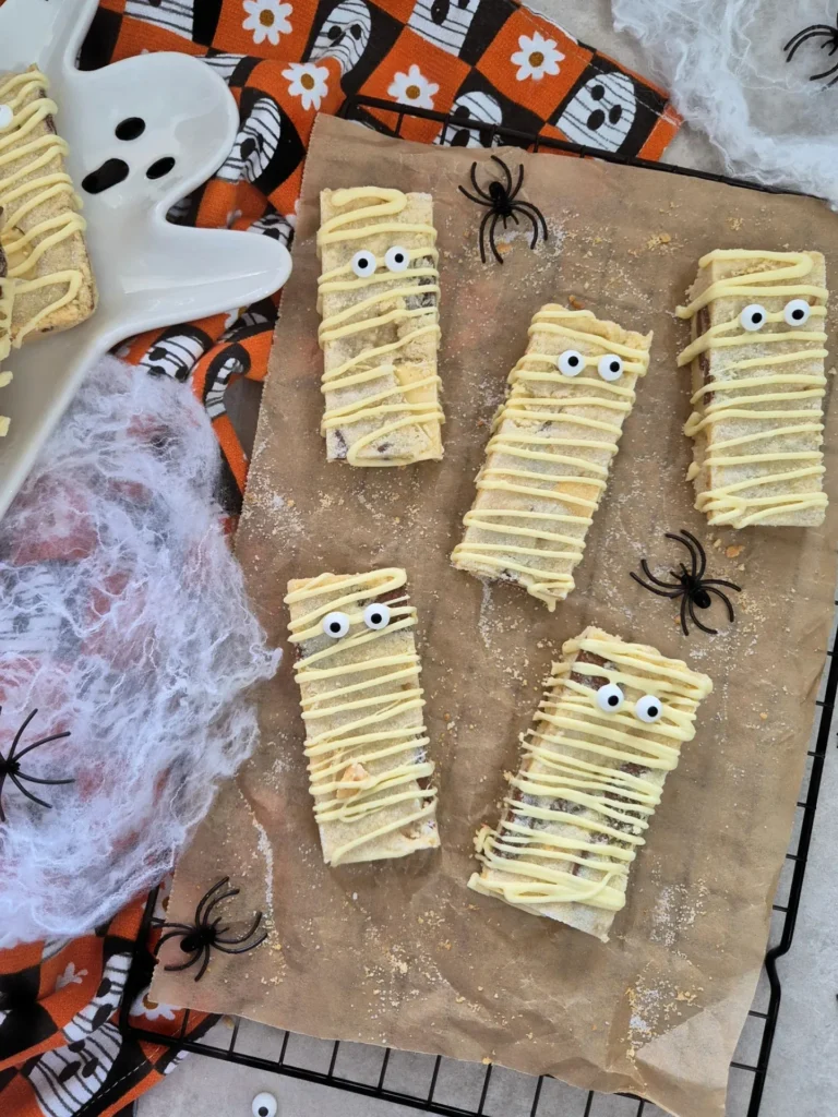 17 Halloween Finger Food Ideas for a Spooky Party Everyone Will Love 14 Halloween Mummy Shortbread Cookies