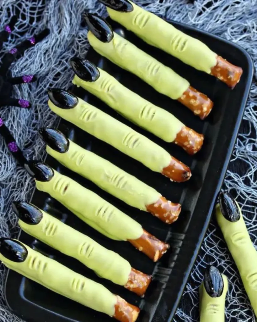 17 Halloween Finger Food Ideas for a Spooky Party Everyone Will Love 9 Witch Finger Pretzels
