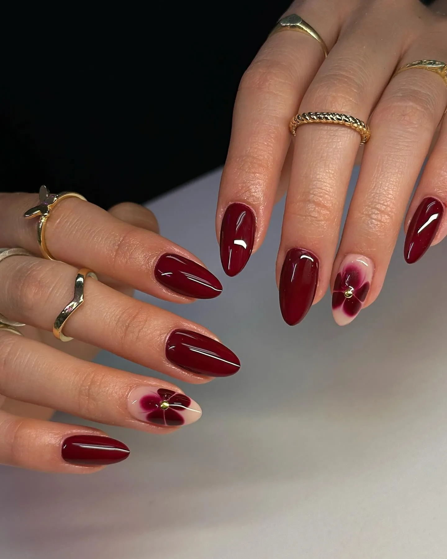 Glossy Maroon Almond Nails