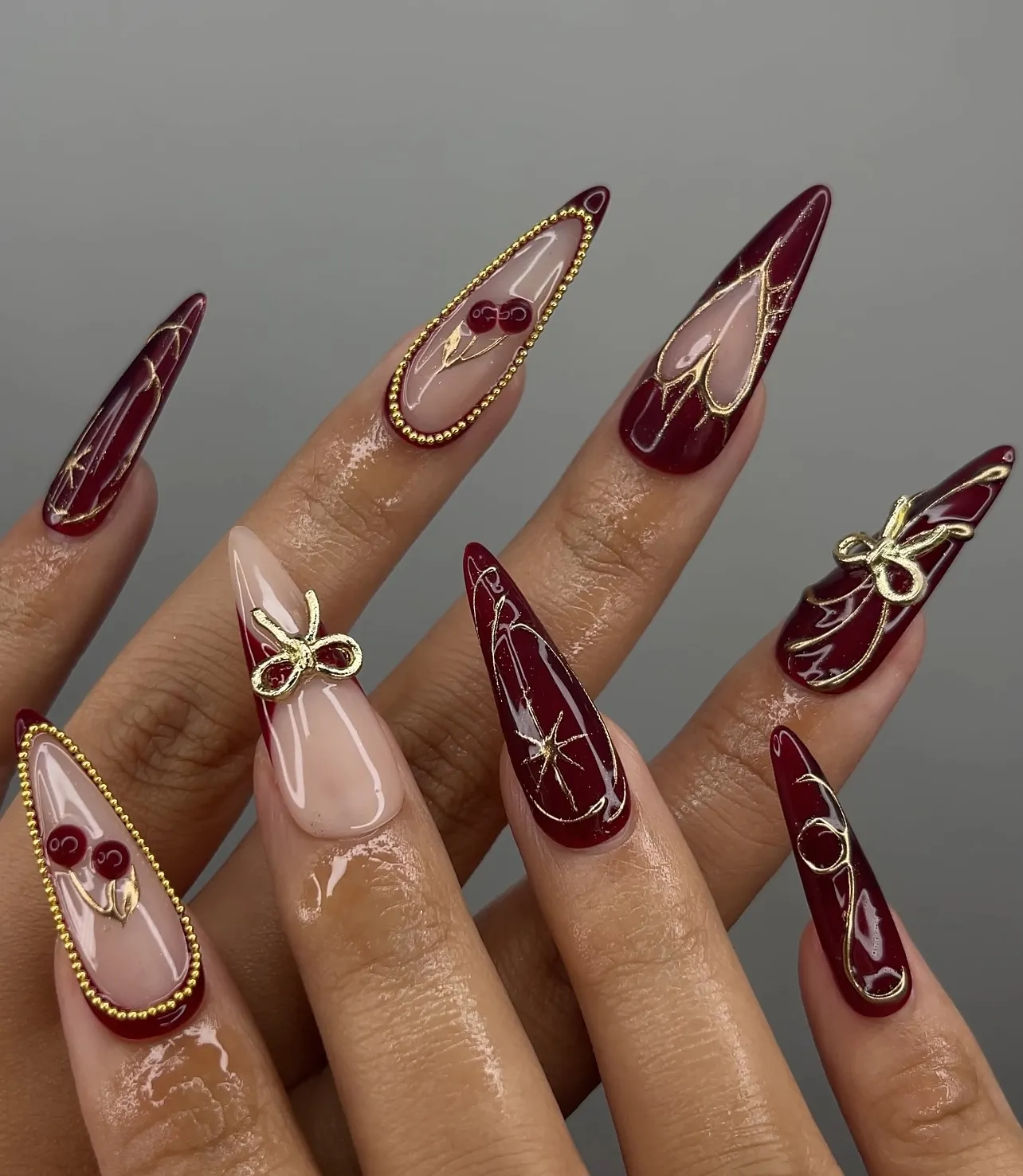 Maroon and Gold Nails